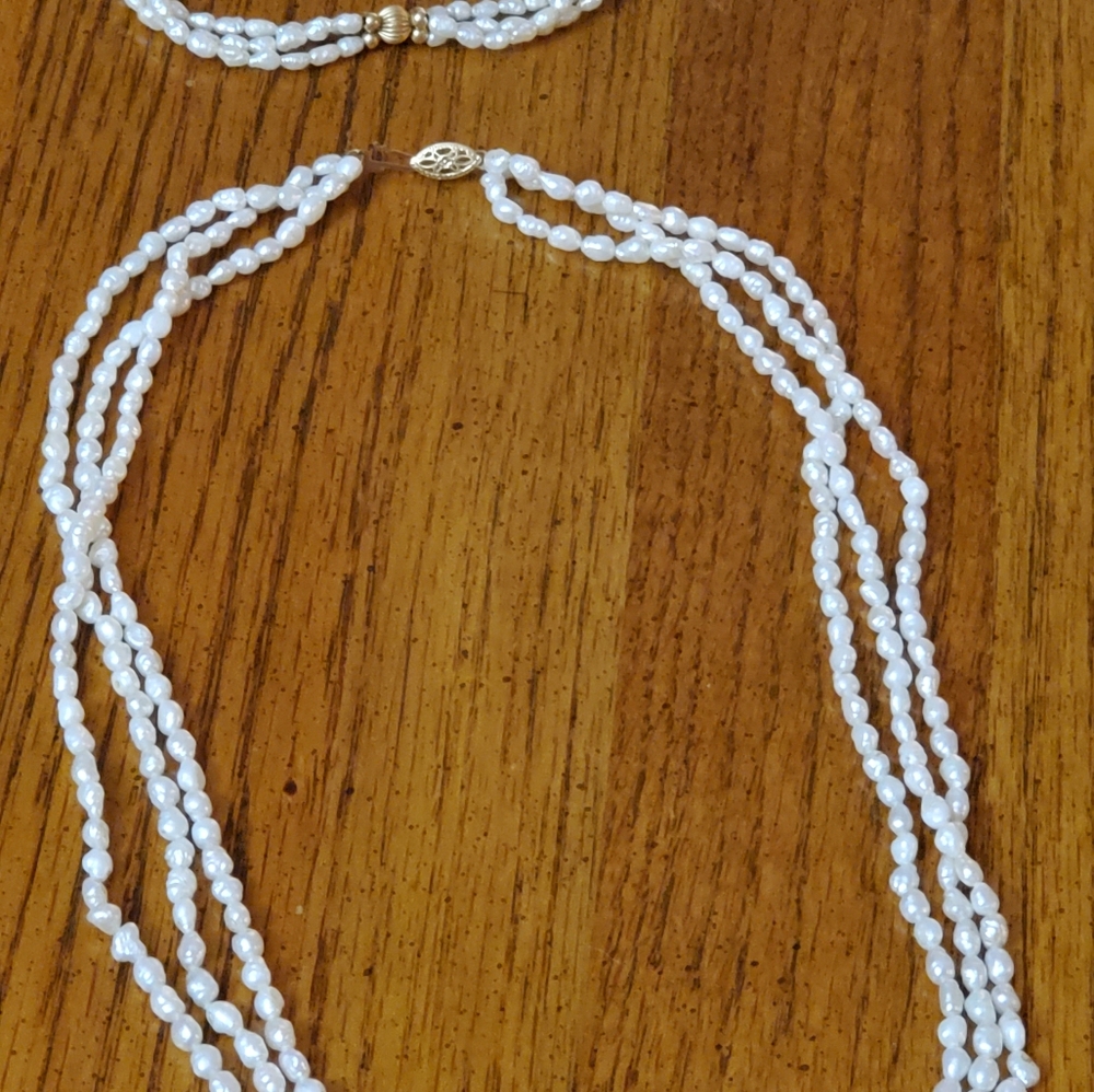 14k gold clasp triple strand pearl necklace and bracelet EUC